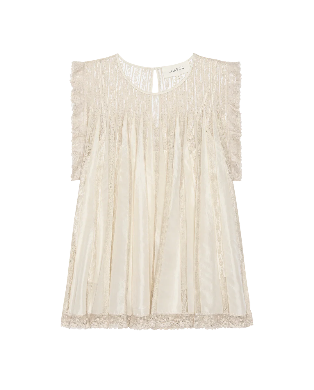 The Keepsake Lace Shell Top by The Great Inc. is a cream short-sleeve Victorian blouse with sheer panels, pleated details, and lace trim on sleeves and hem, shown against a white background.