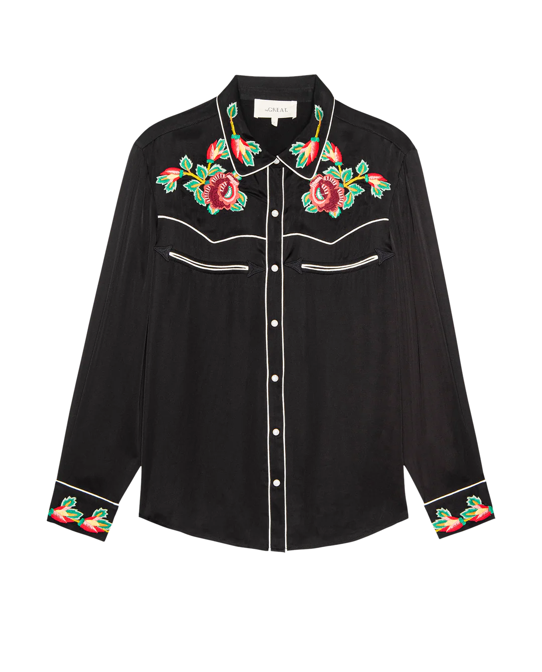 The Great Inc. Heirloom Rose Western Shirt is a long-sleeved black shirt with white piping, red and green rose embroidery on the collar, chest, and cuffs, and classic pearl snaps down the front.
