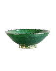 The Tamegroute Bowl by Blue Ocean Traders features a wide, shallow shape, glossy green glaze, and scalloped rim. Hand-shaped for a unique decorative accent, it is shown on a white background.