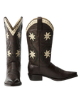 The Great Inc. Leather Floral Cowboy Boot features dark brown handcrafted leather, pointed toes, decorative stitching, cream tops, and star-shaped side designs—classic western style shown from both front and side views.