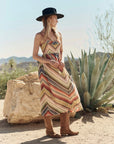 Verse Dress by The Great Inc. styled with cowboy boots and hat, shown in a desert landscape with agave plants.