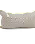 The Hedgehouse Lumbar Pillow 14x26 features black and white diagonal stripes, a cream tassel on one corner, neon green piping, and is washable—making it pop against any white background.