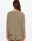 Cream and black striped long sleeve top by The Upside, Santos Rio style, shown from the back on white background.