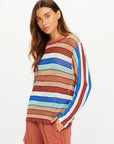 IZA MILLA long sleeve knit top in sage by The Upside, paired with rust pants against a plain background.