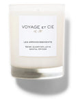 Discover elegance with the 14 OZ Classic Highball soy coconut candle by Voyage Et Cie in a clear glass jar, featuring a label "Les Arrondissements, 5ème Quartier Latin, Santal Épicé." Enjoy organic, sustainable luxury.