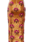 Le Superbe’s Desert Flower Liza Skirt is a gold sequin midi with pink and brown floral appliqués and a visible back zipper—an eye-catching statement perfect for parties.