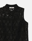 A close-up of the FRAME Deco Lace Dress, a sleeveless black design with floral lace, scalloped collar, and button-down front, shown against a white background.