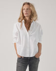 Monday12 Zoe Shirt in soft fabric paired with jeans, styled casually with hands in pockets, Bungalow Furniture & Accessories.