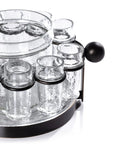 The Zodax Ten Shot Tequila Set w/Ice Bucket includes clear textured shot glasses in a circular black metal holder with handle, centered around a matching glass ice bucket—perfect for stylish tequila serving.