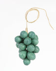 The Faire Handcrafted Grapes Soap features green, grape-like clusters made from olive oil soap, attached to a twisted string loop for hanging, shown against a plain white background.