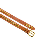 The Jerome Dreyfuss Festival Ceinture/Belt is crafted from brown cowskin and elegantly showcases large gold studs on a white background. Its shiny gold buckle and multiple adjustment holes enhance both style and functionality.