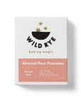Wild Rye Almond Flour Pancake Mix, labeled “Gluten Free,” features bold modern text and a starry bowl design, highlighting nutrient-dense ingredients and offering low sugar, off-the-charts delicious pancakes.
