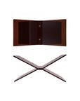 The Bloomingville Acrylic Book Holder, featuring two interlocking flat panels in an X-shape, is displayed from top and side views against a white background. The holder has a brown, amber-like appearance.