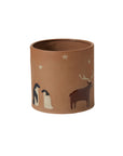 Accent Decor Antarctica Pot: brown cylindrical ceramic vase featuring raised penguin, reindeer, and star designs—perfect for showcasing your favorite plants with a charming arctic critter theme.