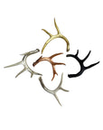 Set of five metallic antler accents by Faire in gold, silver, copper, black, and bronze for coffee table decor.