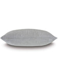 The Sprouse Linear Pillow by Eastern Accents is shown in side profile against a white background. The pillow looks soft and evenly filled, featuring a smooth fabric surface and slightly pointed ends.