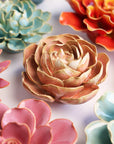 A close-up of the Peach Pink Peony by Chive Ceramics (thru Faire), a glossy ceramic succulent with intricate petals—perfect as a colorful, decorative accent for your tabletop or wall.