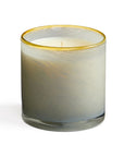 The Lafco NY Beach House Candle is a white soy wax candle with a single wick in hand-blown glass, featuring a swirled frosted gray design and thin gold rim. Part of the Sea & Dune collection.