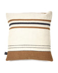 The Foundry Pillow by Libeco Home is a square cushion with a neutral cream artisanal linen cover, accented by horizontal brown, black, and beige stripes of varying widths and finished with a small black side tag.