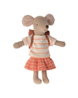 Maileg Tricycle Mouse, Big Sister by Maileg is a plush toy in a cream and orange striped shirt, plaid skirt, and brown backpack. Hidden magnets let her hold accessories or stay put during play. Shown on a white background.