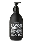 A black pump bottle labeled "Liquid Marseille Soap 10 oz" by Cie Luxe Brands, featuring French text, stands against a plain white background.