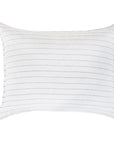 The Blake Big Pillow 28x36 by POM POM showcases a minimalist design with interwoven stripes. Its thin horizontal gray lines on a white background highlight subtle elegance, reflecting the beauty of hand-loomed craftsmanship.