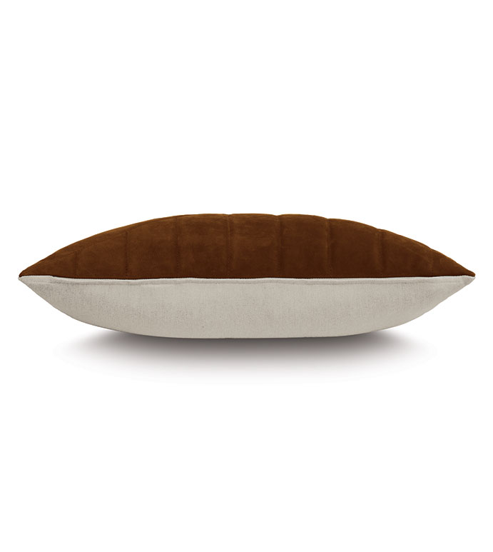 The Rufus Nubuck Leather Pillow by Eastern Accents is shown from the side against a white background, featuring a brown suede-like top, light beige fabric bottom, and subtle channeled detail.