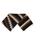 The Faire XL Mexican Diamond Blanket in brown and black features a geometric design with zigzag and stripe patterns, inspired by traditional Mexican textiles, shown against a white background.