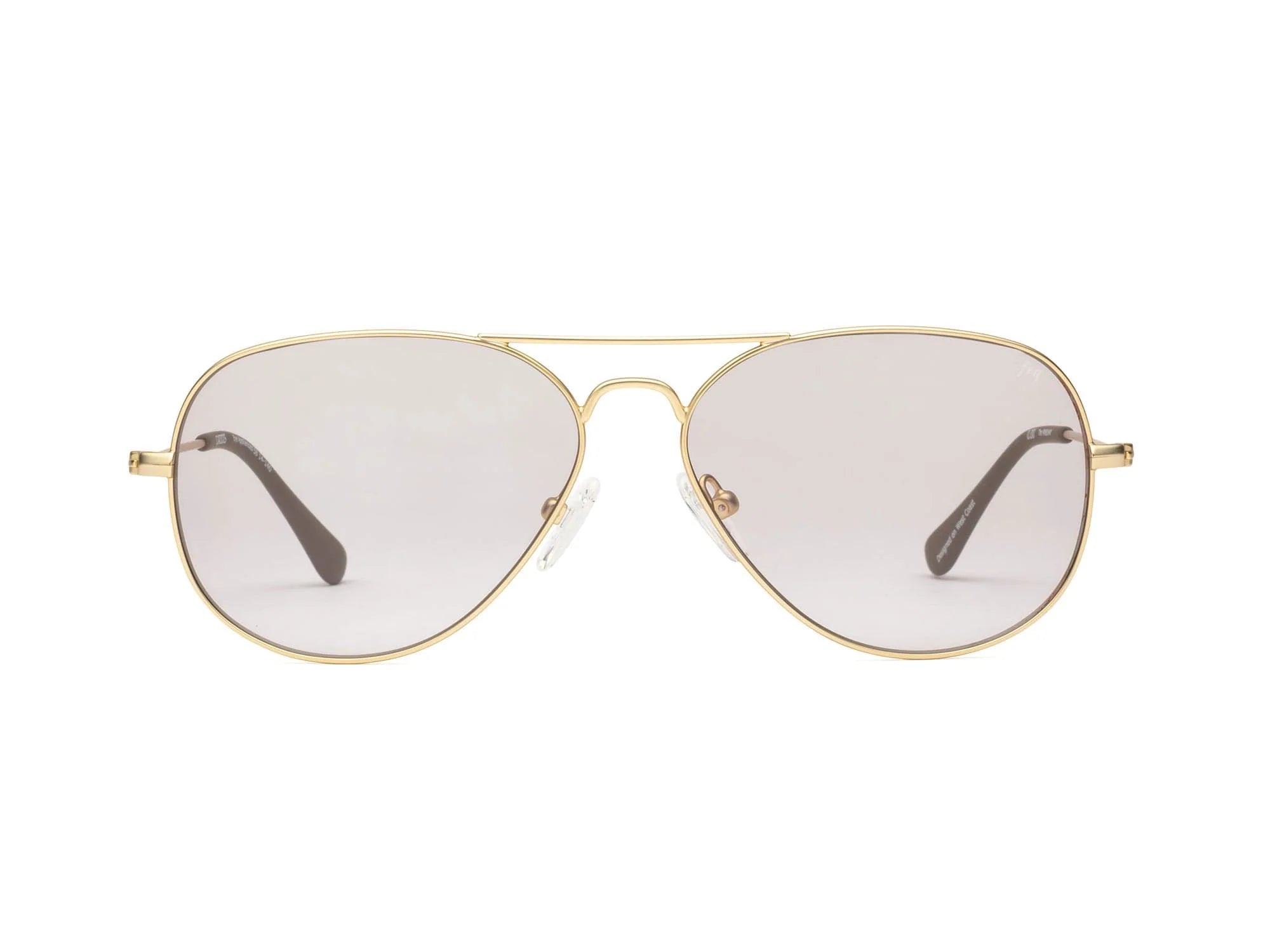 A pair of Mabuhay Matte Gold aviator sunglasses with gold frames and lightly tinted lenses, isolated on a white background by Caddis.