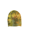 The Faire Cashmere Beanie showcases a hand-dyed green, yellow, and brown tie-dye pattern, displayed on a plain white background.
