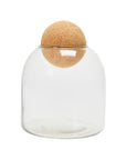 The Bloomingville AH2201 Glass Jar Cork Ball features a clear, dome-shaped design with a wide opening and a round cork lid that fits snugly—ideal for home decor. The empty jar is showcased against a white background.