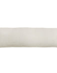 The Montauk Body Pillow by POM POM is a long, rectangular off-white pillow with a smooth plain surface, crafted from hand-loomed linen and displayed against a white background.