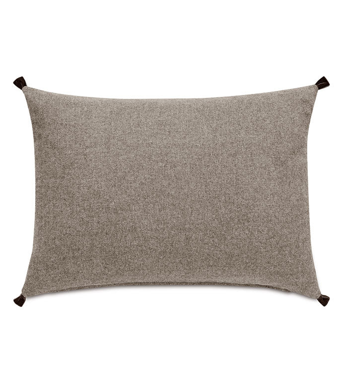 The CRISTOBAL FAUX LEATHER pillow by Eastern Accents is a rectangular, light brown decorative accent with a soft texture and small dark tassels on each corner, shown against a white background.