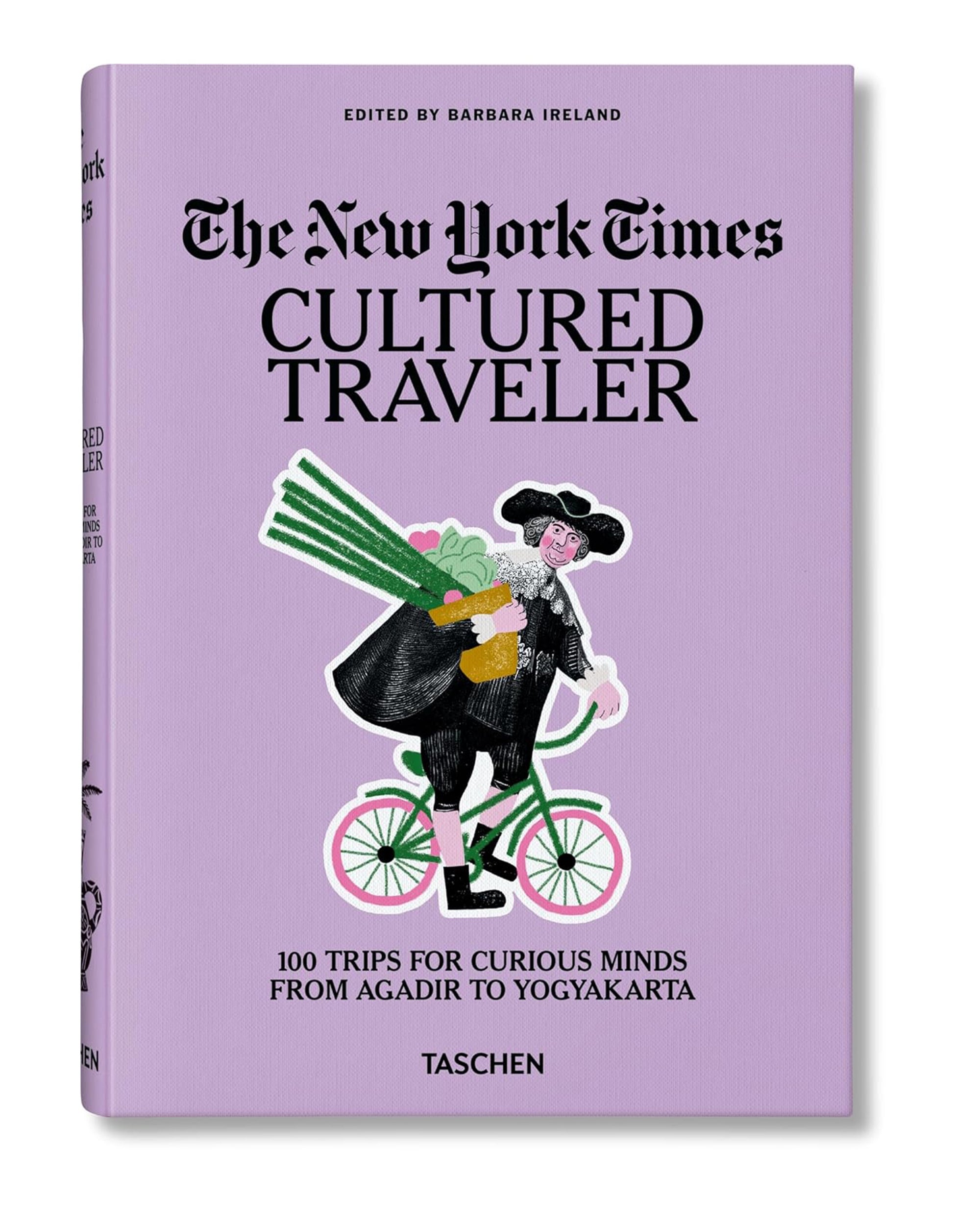 The "New York Times Cultured Traveler 100 Trips" by Ingram Book Company features a lavender cover with a historic man on a green bike, carrying flowers and groceries—a charming guide to 100 journeys worldwide.