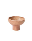 The 54846 Cyrus Compote by Accent Decor is a small ceramic piece with a wide wavy rim and short pedestal base, featuring a pinkish-beige speckled glaze, shown against a plain white background.