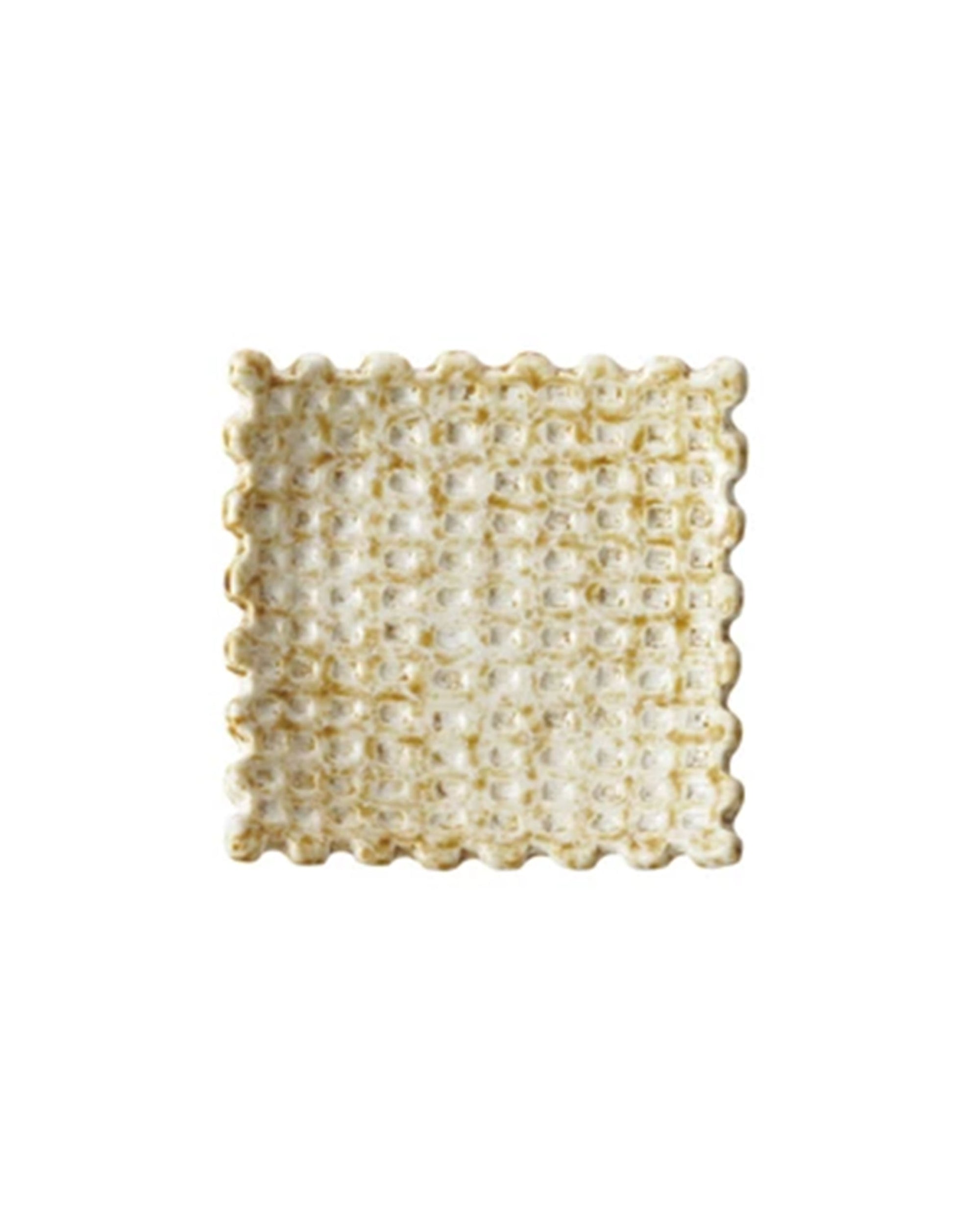 A single Debossed Stoneware Dish by Bloomingville, featuring a wavy, scalloped edge and grid-like debossed surface, displayed on a plain white background.