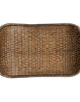 The Creative Co-op Woven Wicker Vintage is a rectangular, shallow basket with tightly woven brown fibers and an antique finish, shown from above on a white background.