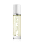 A clear glass Heretic 15ML Perfume bottle by Faire, featuring a white cap and light yellow liquid. The "DIRTY PEACH" label suggests a plant-based fragrance with sandalwood and vanilla notes.