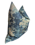Blue and beige floral pillow with pointed corners by Faire, polyester cover, shown on white background.