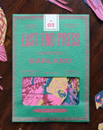 A green and pink Faire box with a window displays colorful bird-shaped Paper Garland/Chains inside, surrounded by matching bird cutouts—ideal festive décor for any space.