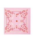 The MME Cocktail Napkin by Faire features a pink bandana design with intricate floral and paisley patterns in red and white. Its symmetrical look boasts a central floral motif surrounded by ornate decorative elements.