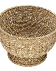 Large handwoven seagrass basket with wide opening, sturdy design by Faire’s Face to Face for stylish storage.