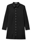 The Felicia Poplin Dress by Perfectwhitetee is a long-sleeve black button-down with a classic collar and white buttons, crafted from cotton poplin. Shown laid flat on a white background, it’s ideal for everyday wear.