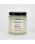 A glass jar candle with a black lid, labeled "Austin Press Travel Candle" by Faire, made from botanical waxes and essential oils, sits on a white background.