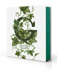 G: Forever Green by Hachette Book Group features a white cover with a large, leafy green "G" and cursive text "Forever Green... la dolce Vita." The book’s green-edged pages evoke the charm of verdant interiors.