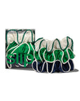 Three large Game Day Large Scrunchies by Faire in green, white, and navy with wavy edges are shown beside a "slip" box. These silk scrunchies help prevent hair breakage while giving your hair a stylish boost.