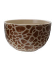 The Creative Co-op Bowl with Animal Print features a stoneware design with a beige base and irregular brown spots, perfect for small servings. Shown on a white background.
