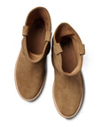 Top view of Beek's GROUSE boots in tan suede, featuring rounded toes, a slouchy silhouette, and pull-on tabs, shown on a white background.
