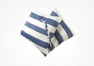 Two Hedgehouse Throwbed pillows with bold navy blue and white horizontal stripes, featuring cotton removable covers, are positioned overlapping each other on a plain white background.