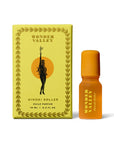A yellow Faire Hinoki Roll On box with an illustration of a woman holding a branch sits next to a small orange bottle labeled "Faire Hinoki Roll On," featuring a plant-based fragrance with hinoki cedar scent.